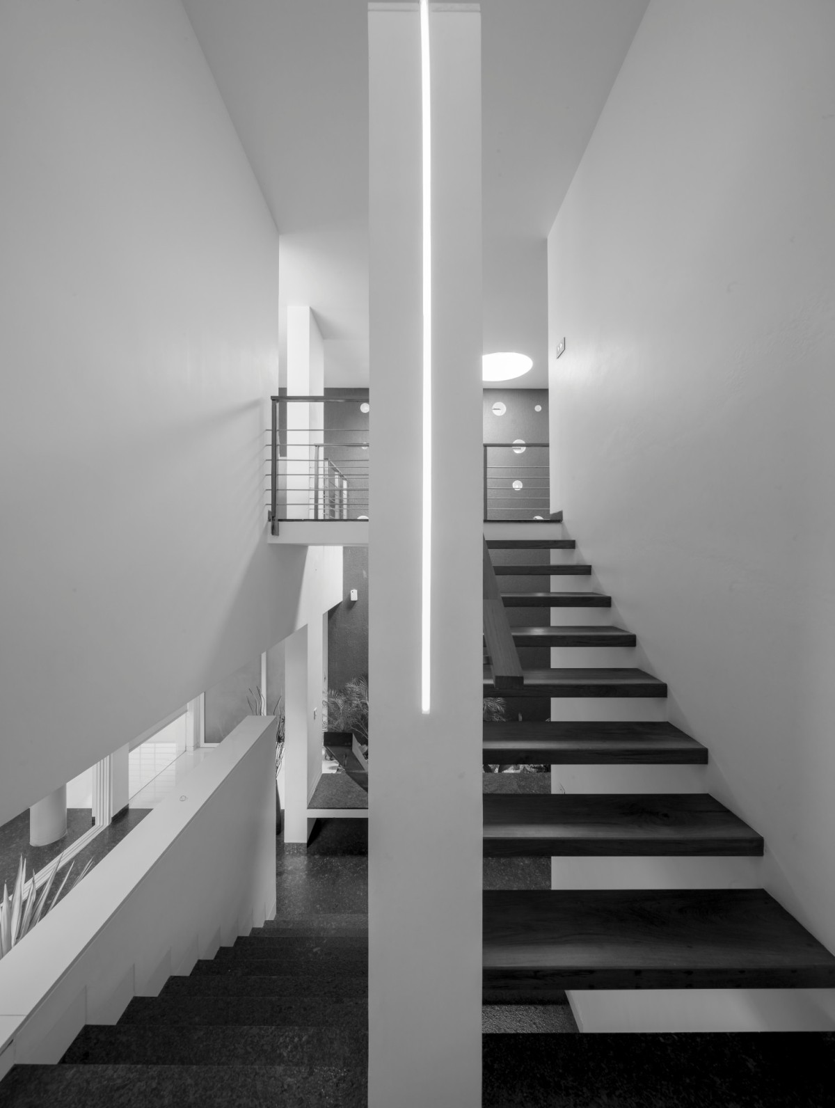 Staircase of The Floating Parasol House by LIJO.RENY.architects