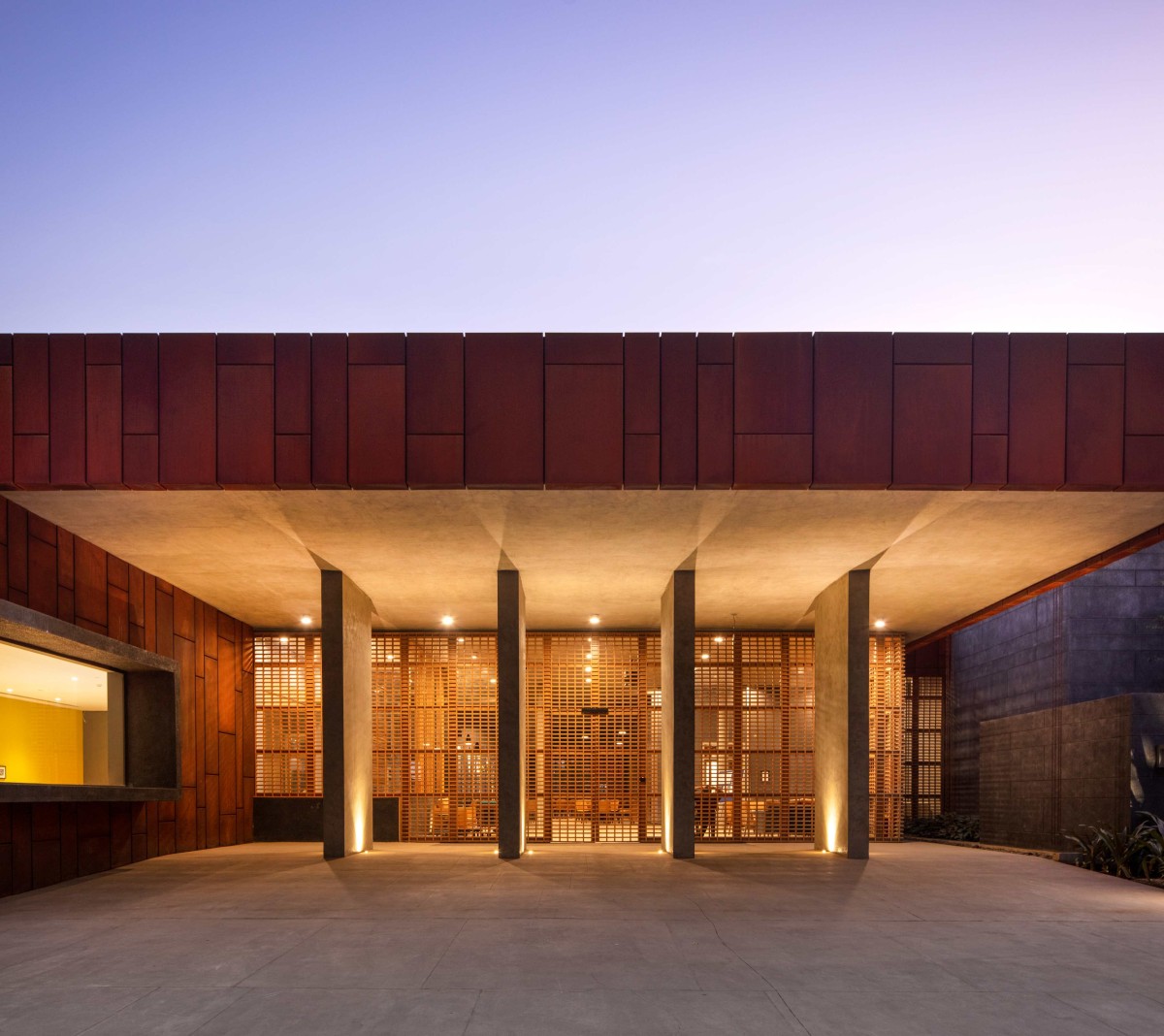 Night shot of entrance of The Centrum Club by Abin Design Studio