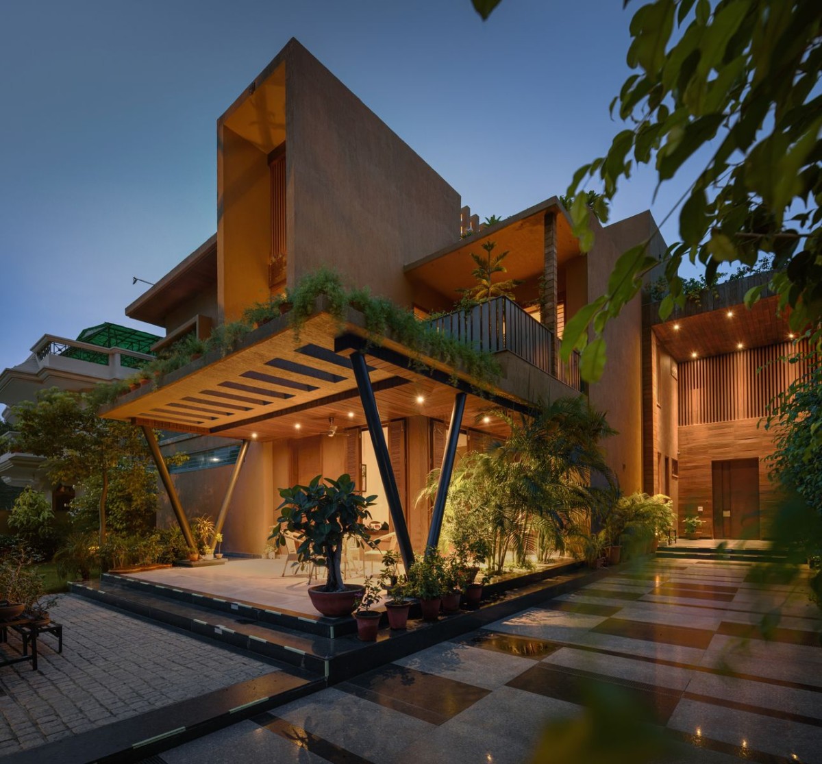 Dusk light exterior view of Harmony Courtyard Villa by Studio Clay