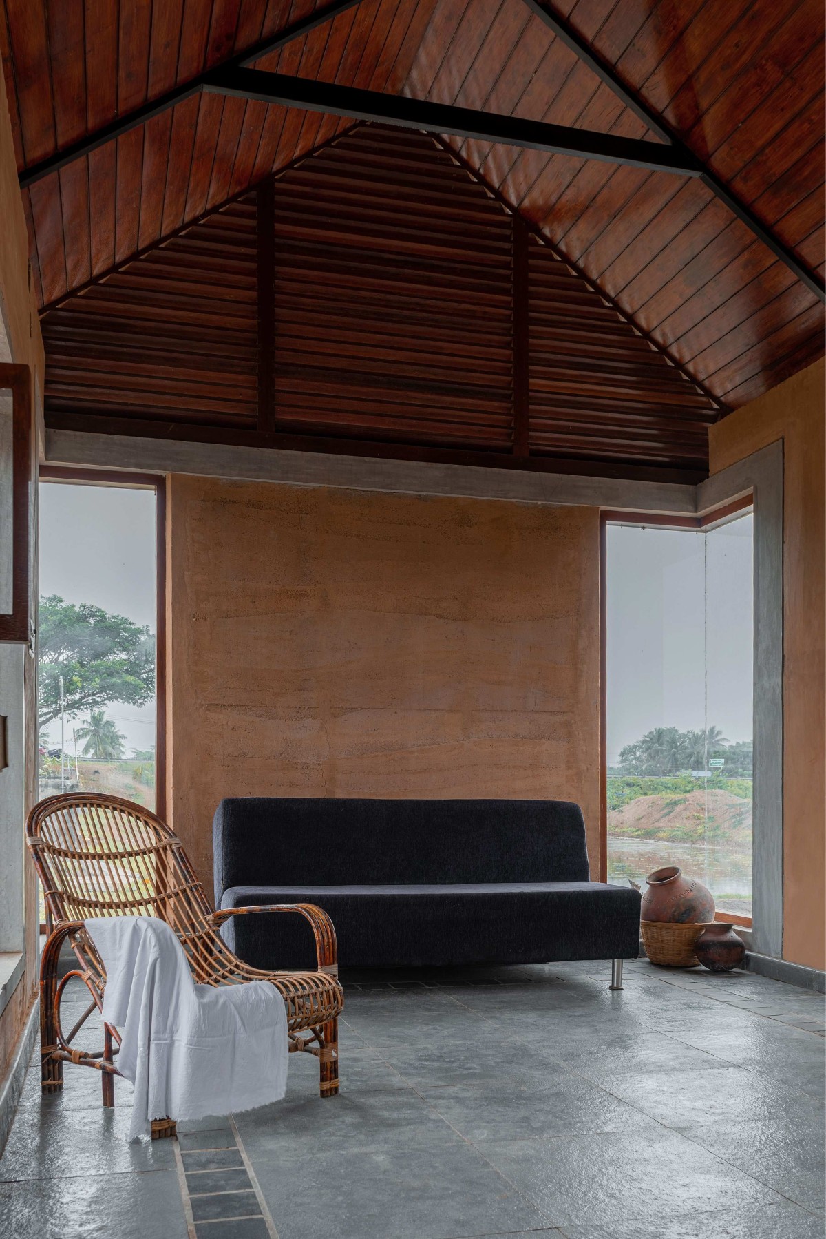 Living room of SITH Villa by Aagaram Architects