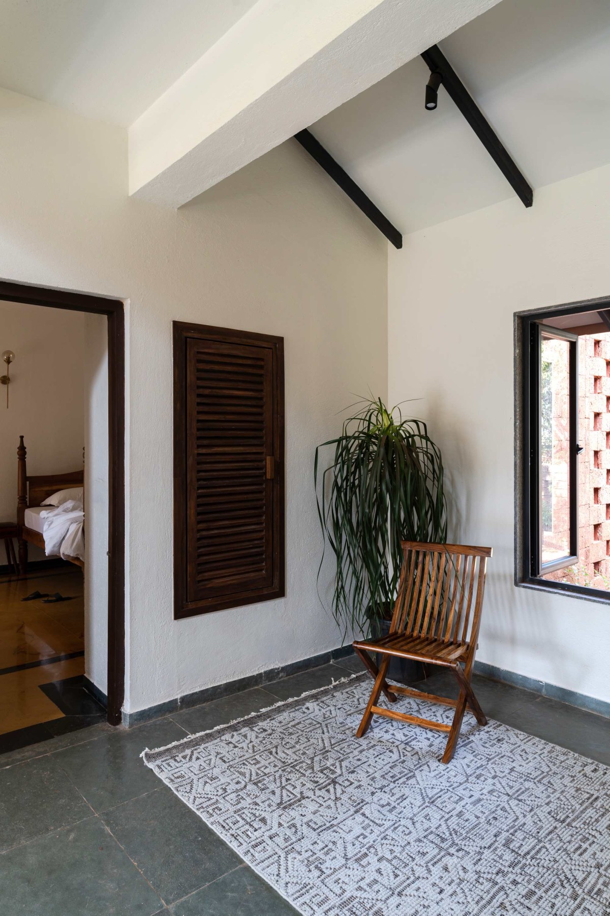 Passage to bedroom of Maison Rouge by The Architecture Company