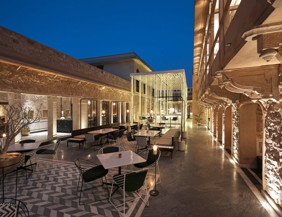 Night shot of courtyard seating of Baradari by Studio Lotus