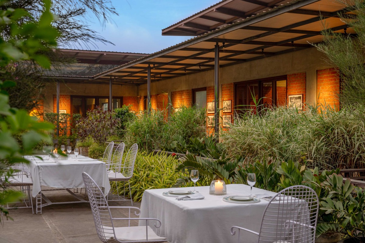 Outdoor Dining of Under The Neem Tree by Studio HPA