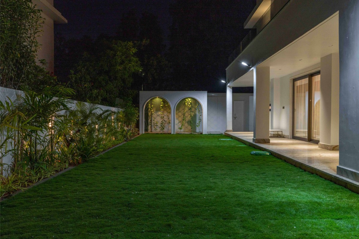 Lawn of Kompally Villa by DH Architecture Studio