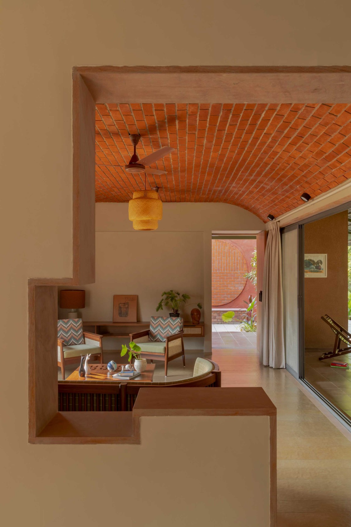 View from kitchen of Courtyard House by the Water by Studio DesignSeed