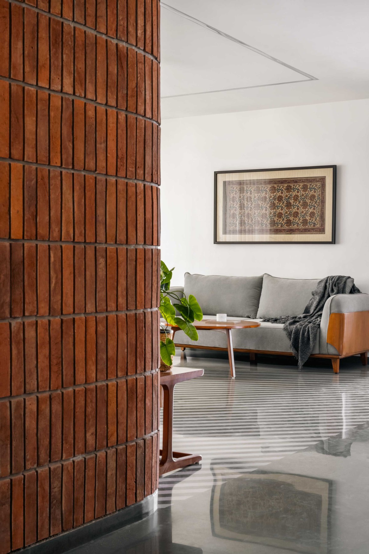 Passage to living room of Earthen Cove by I K Architects