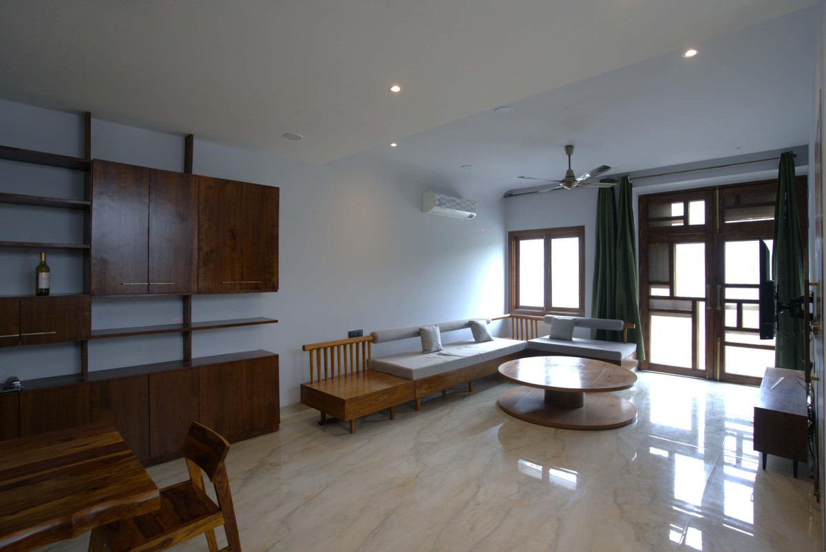 Living room of The Box House by OM Architects