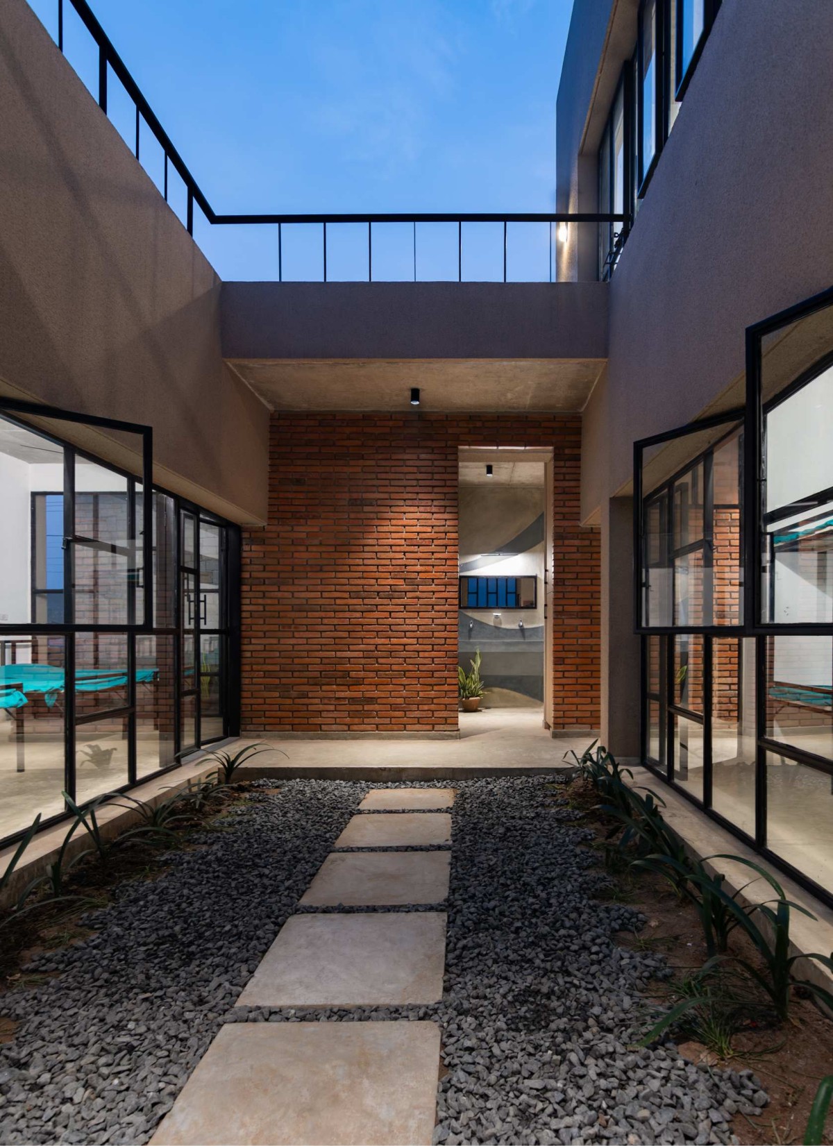 Dusk light shot of courtyard of Compos Mentis Healthcare Architecture by Spacemagus