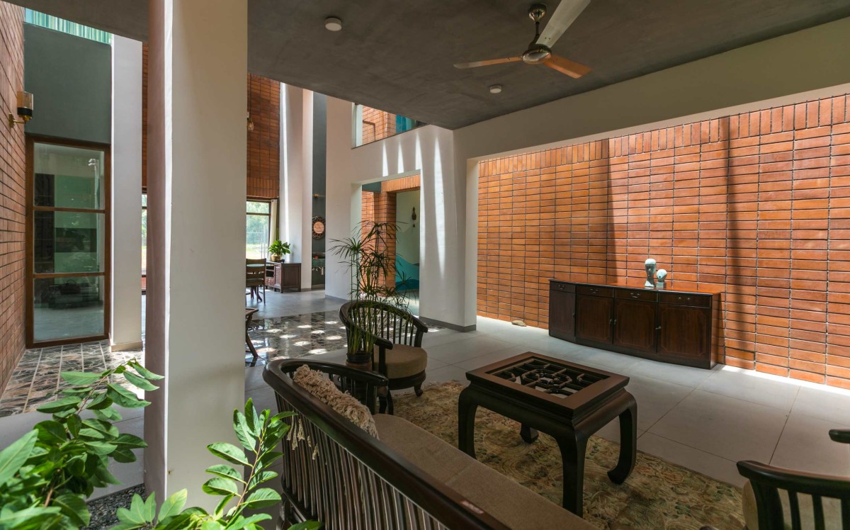 Living room of An Earthy Affair by Collage Architecture Studio