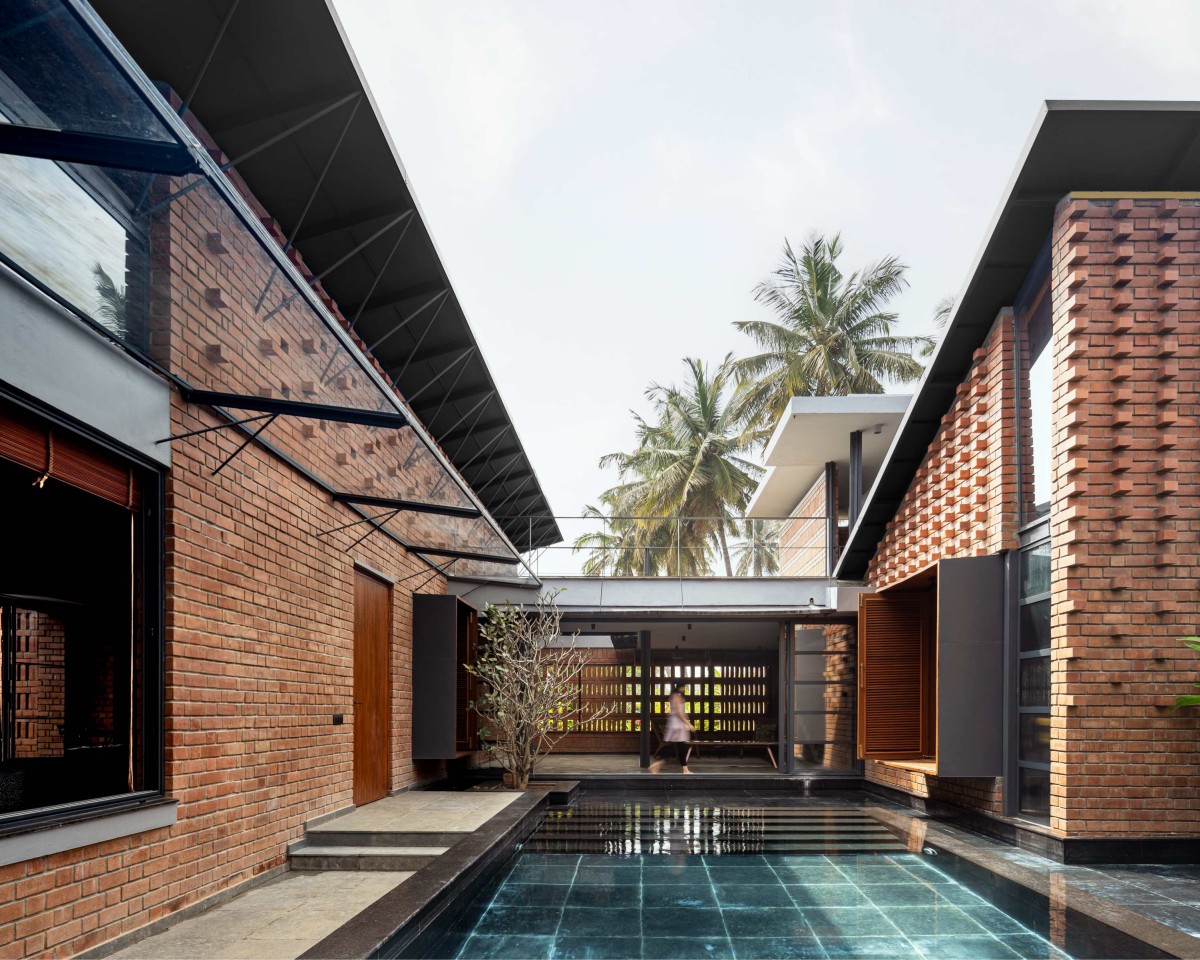 Pool view of Between the Mango Trees by Enviarch Studio