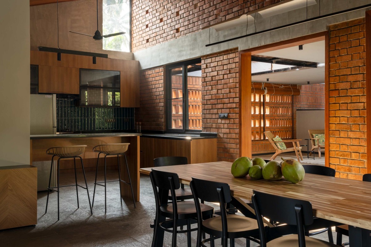 Dining & Kitchen of Between the Mango Trees by Enviarch Studio