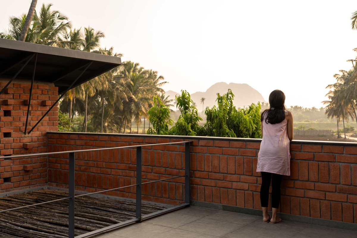 Terrace of Between the Mango Trees by Enviarch Studio