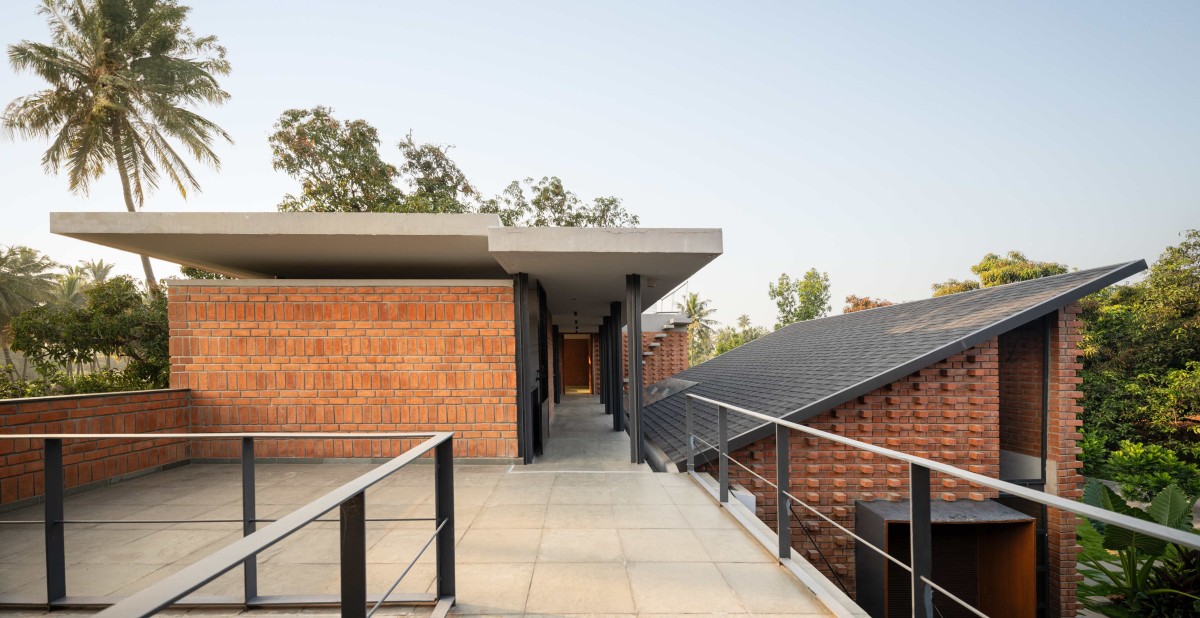 Terrace of Between the Mango Trees by Enviarch Studio