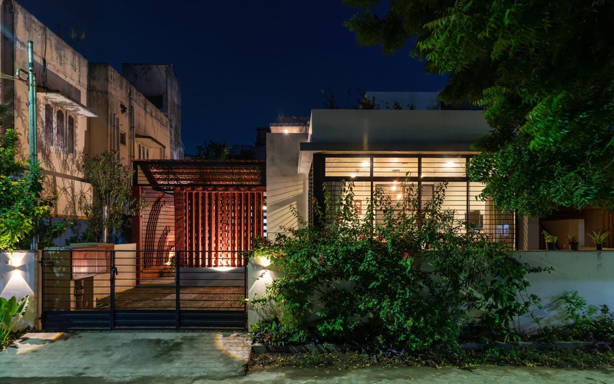 Night shot of exterior of Paati Veedu by Art & Architecture