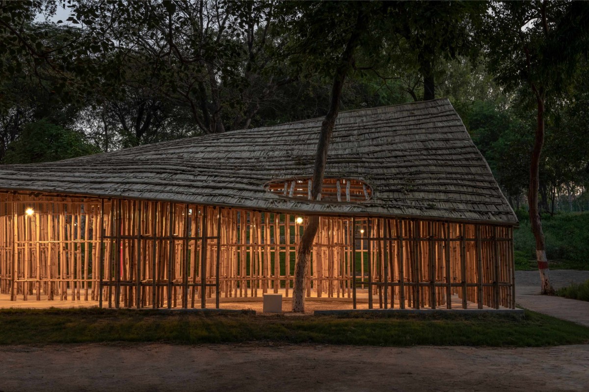 Dusk light view of north east elevation of North-East Bamboo Pavilion by  atArchitecture