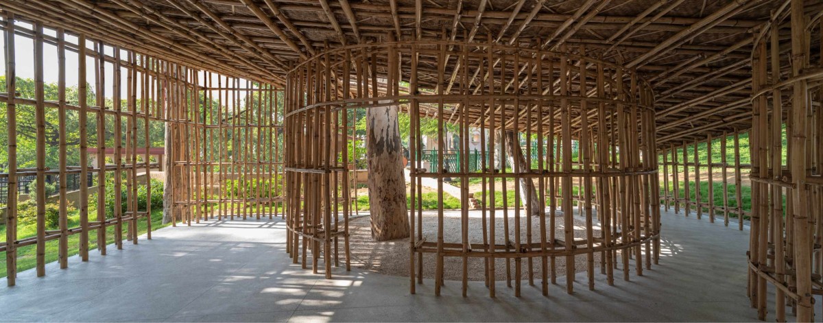 Hyperbolic ceiling of North-East Bamboo Pavilion by  atArchitecture