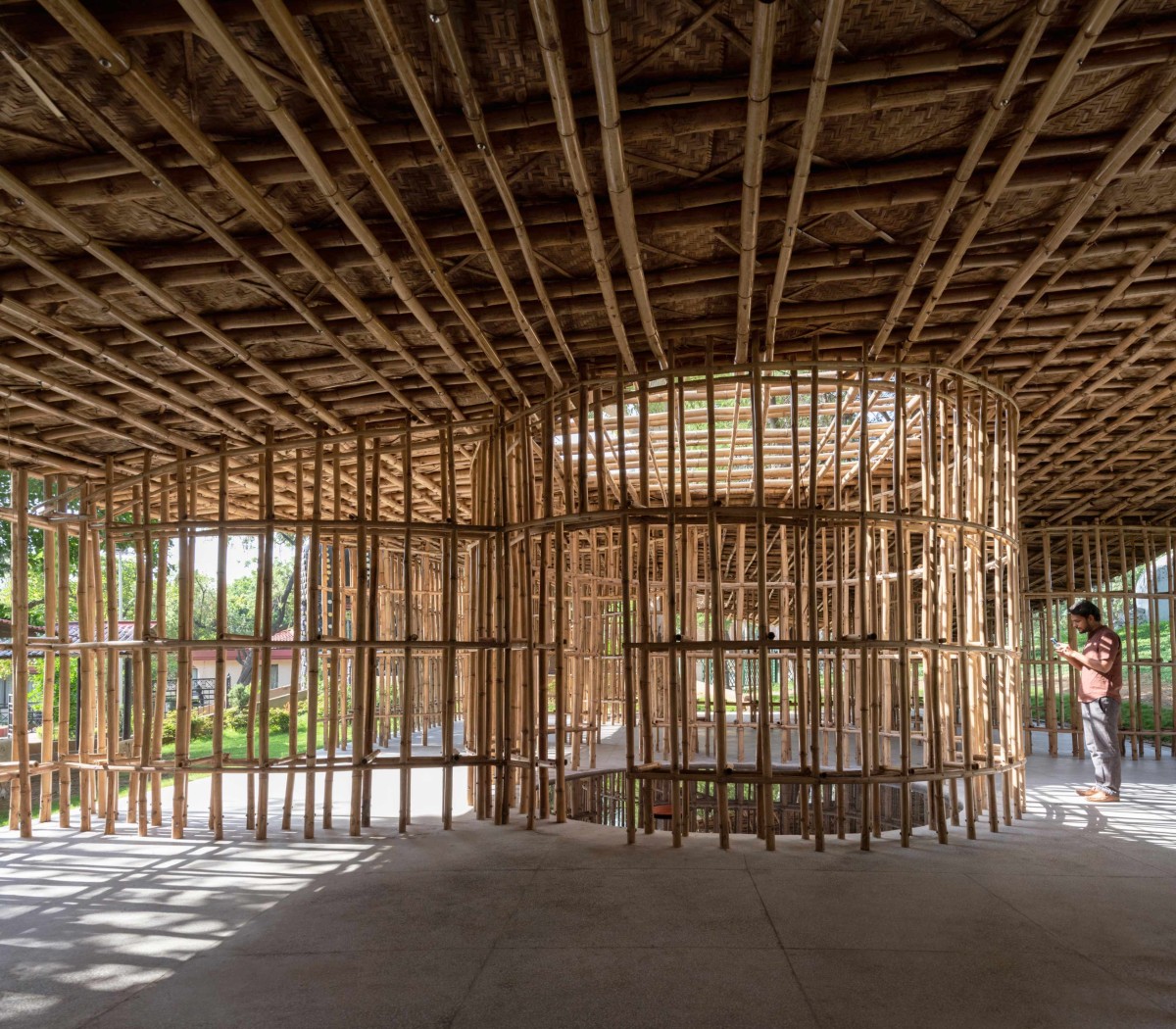 Meghalaya court and winding path of North-East Bamboo Pavilion by  atArchitecture