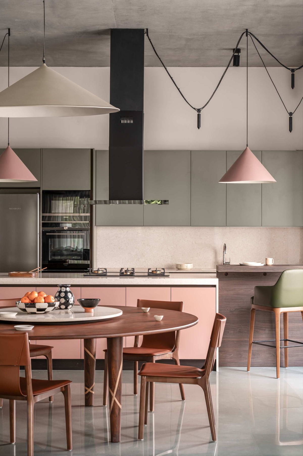 Dining & Kitchen of The Nest by MuseLAB