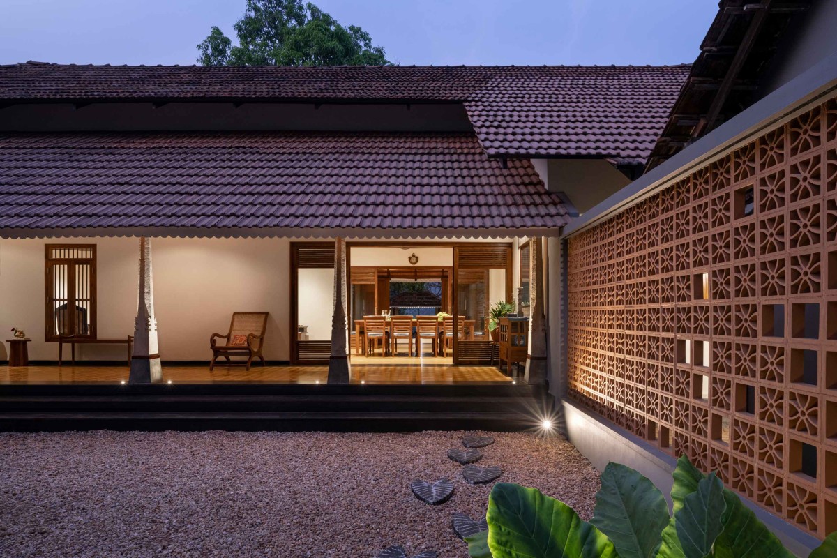 Dusk light courtyard view of Muttom Residence by EDOM Architecture