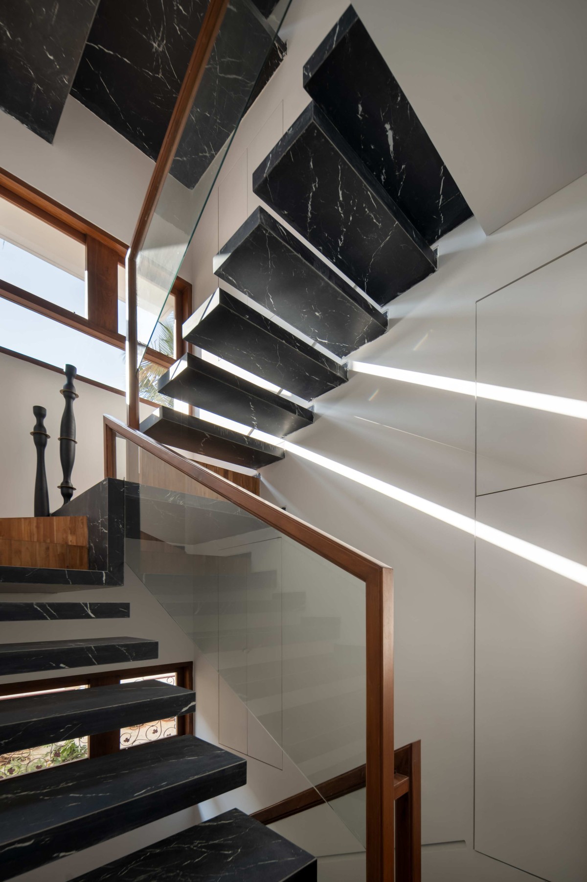 Staircase of Whispering Curves by Suva Architects