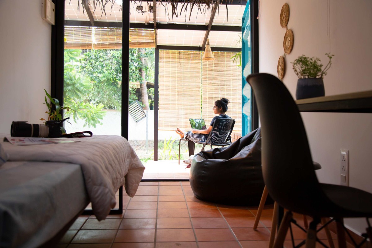 Bedroom & Study Area of Co Home by Walls N Voids Atelier