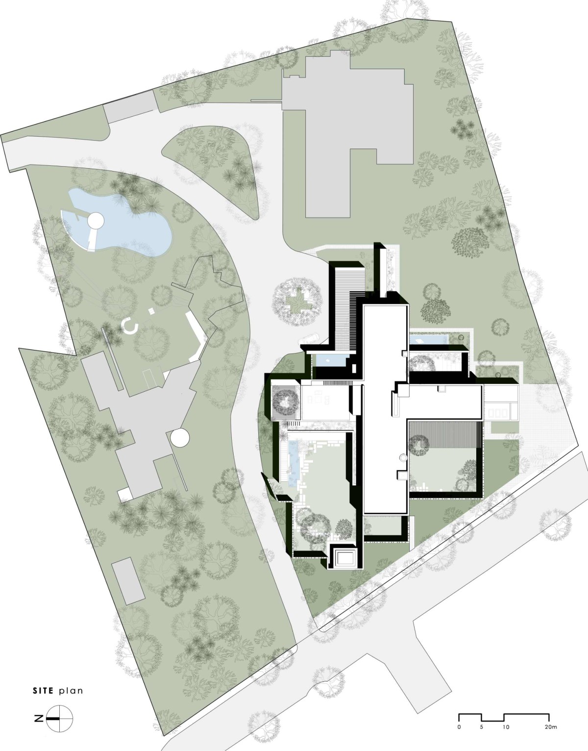 Site Plan of The House Of Secret Gardens by SPASM Design Architects