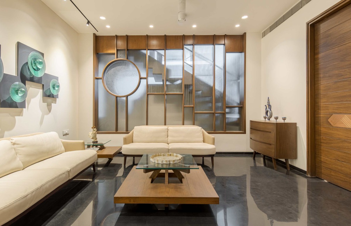 Formal living area of Nandanam by Dalvi Associates