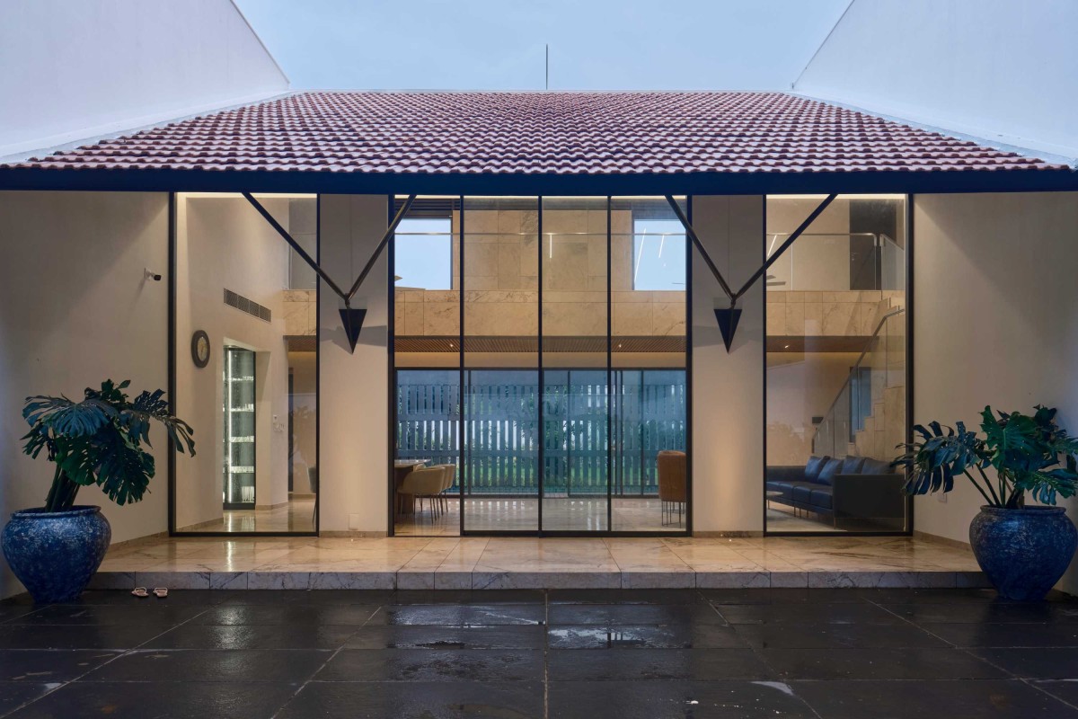 Dusk light exterior view of Mathamangalam House by SOHO Architects