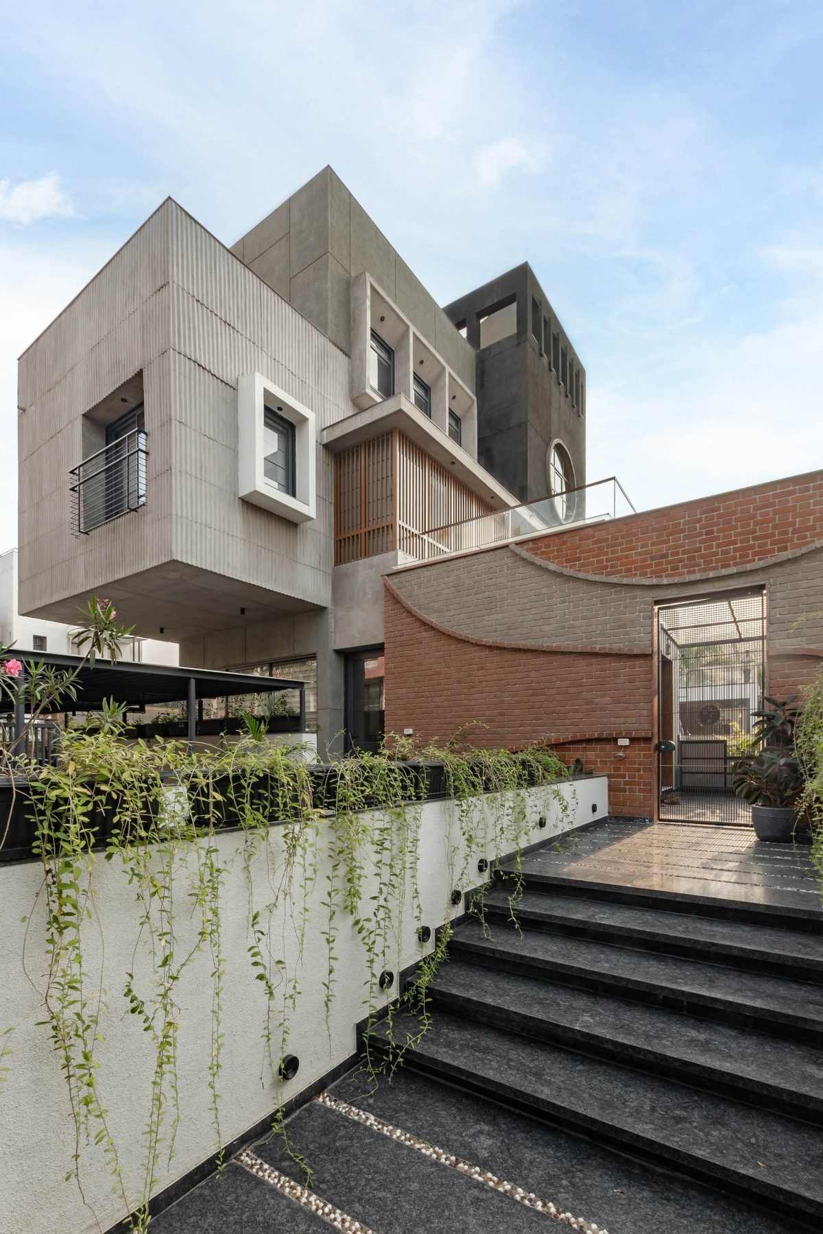 Entrance  view of Harshaangan - A House for Gardens by Aangan Collaborative LLP