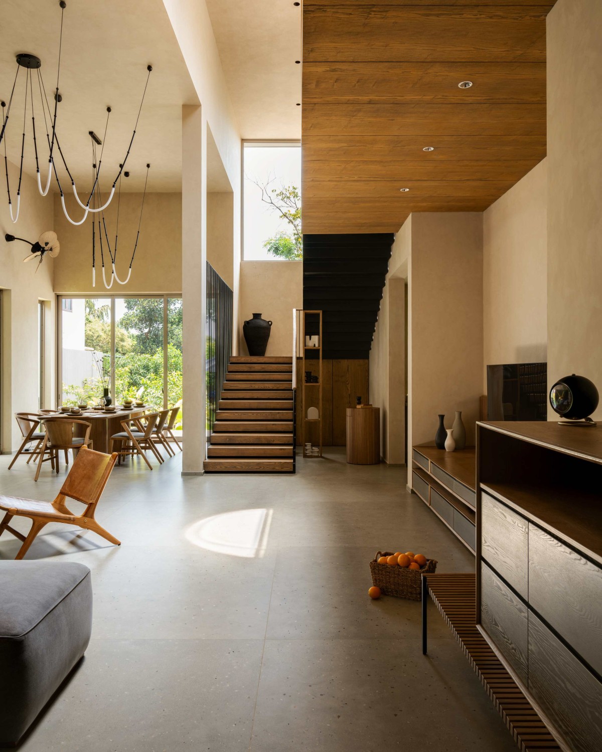 Living to Staircase view of Maison Gris by Sabs Architects