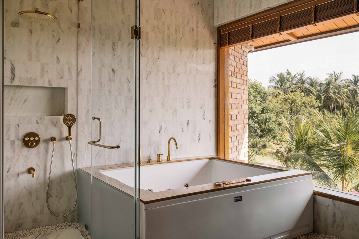 First floor bathroom area of Retreat Home by Neogenesis+Studi0261