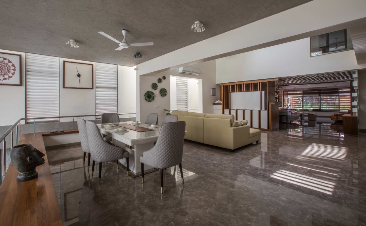 Dining with bench all around over looking the courtyard of H2 by Design plus