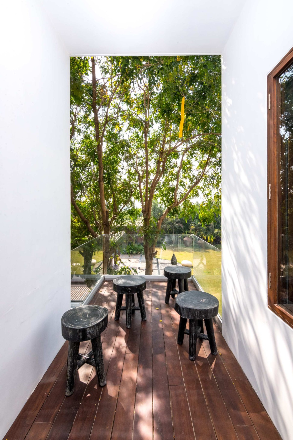Bedroom outdoor seating of The Courtyard House by Associated Architects (i) Pvt. Ltd