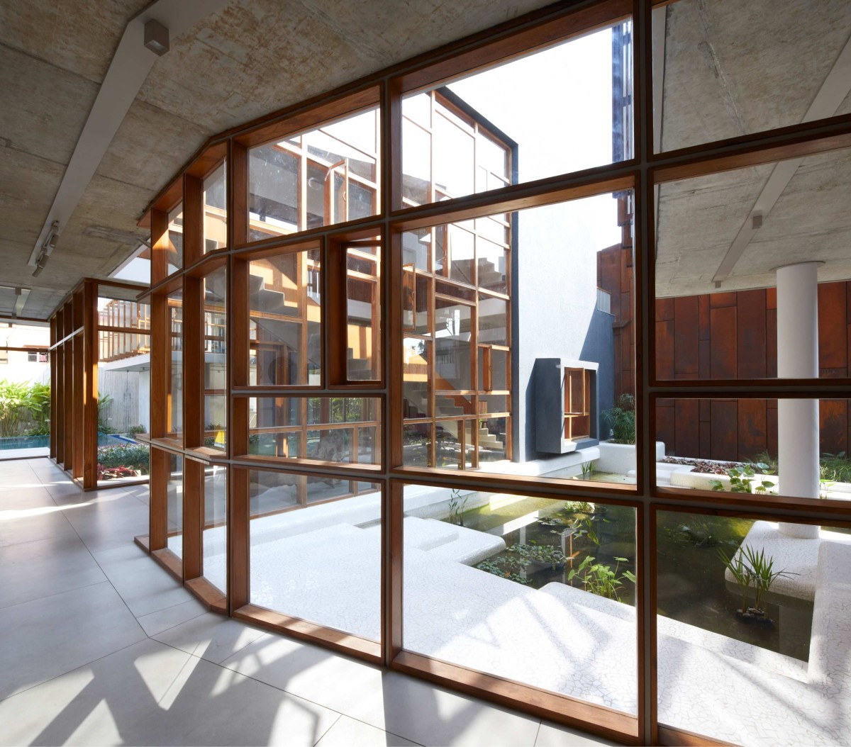 View from study area of Wall House by Abin Design Studio