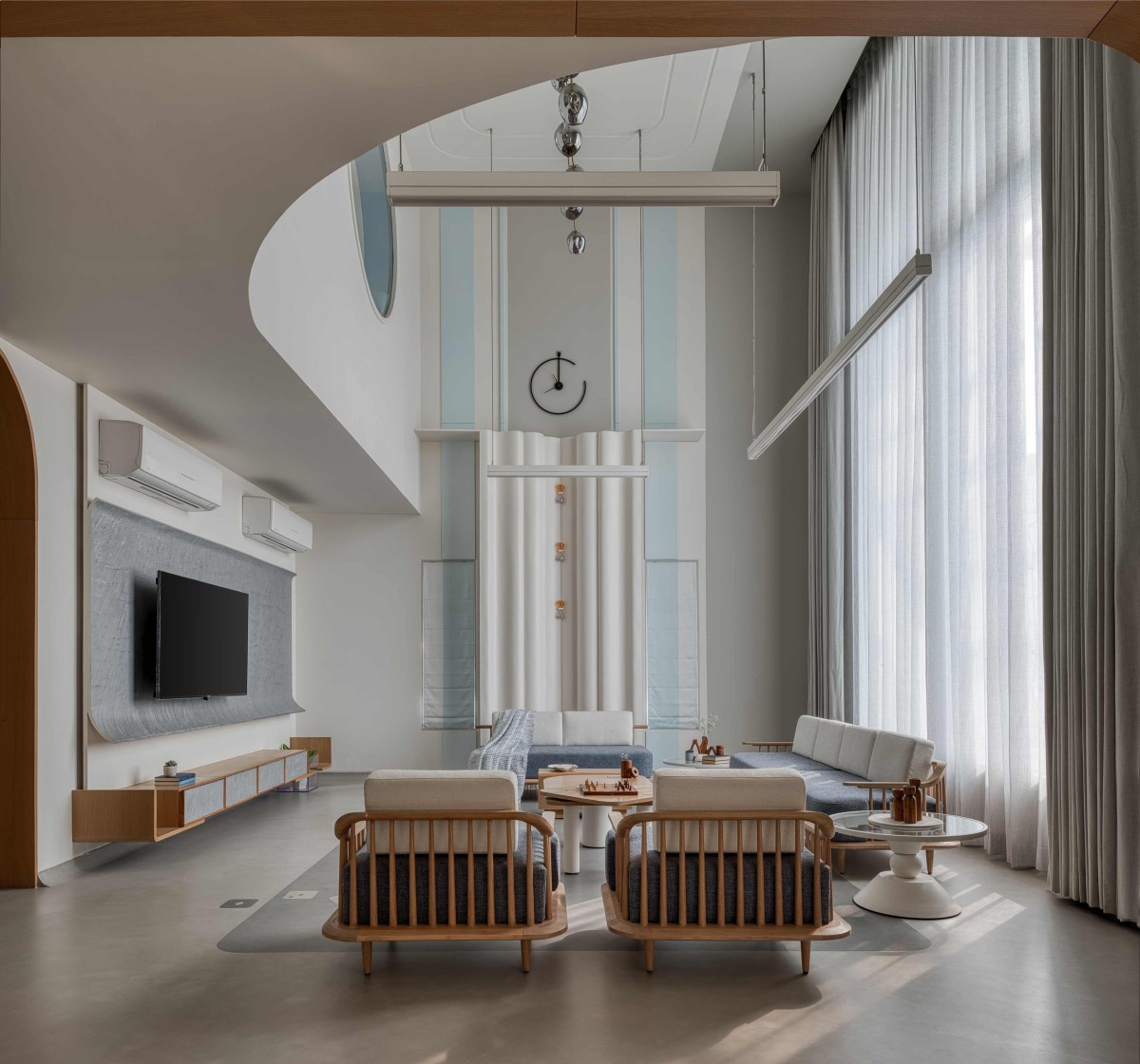 Double height living room of The Framescape by Karaagre Designs
