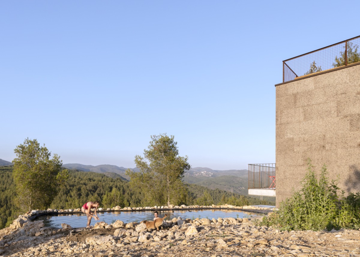 Rainwater from the roofs is collected and used for the garden and a natural pond